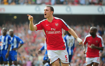 LONDON, ENGLAND - SEPTEMBER 19:  Thomas Vermaelen of Arsenal celebrates his goal during the Barclays Premier League match between Arsenal and Wigan Athletic at the Emirates Stadium on September 19, 2009 in London, England.  (Photo by Clive Mason/Getty Ima