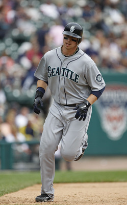 DETROIT - JUNE 12: Justin Smoak #17 of the Seattle Mariners rounds third base after hitting a two run home run in the ninth inning during the game against the Detroit Tigers at Comerica Park on June 12, 2011 in Detroit, Michigan. Seattle defeated the Tige