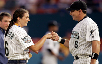 MIAMI - SEPTEMBER 17:  Olympic Gold Medalist in Beach Volleyball, Misty May, is greeted by her fiancee, Matt Treanor #6 of the Florida Marlins, after throwing the ritual first pitch before the start of the Florida Marlins against the Atlanta Braves on Sep