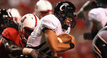 RALEIGH, NC - SEPTEMBER 16: Zack Collaros #12 of the Cincinnati Bearcats runs with the ball against the North Carolina State Wolfpack during their game at Carter-Finley Stadium on September 16, 2010 in Raleigh, North Carolina. (Photo by Streeter Lecka/G