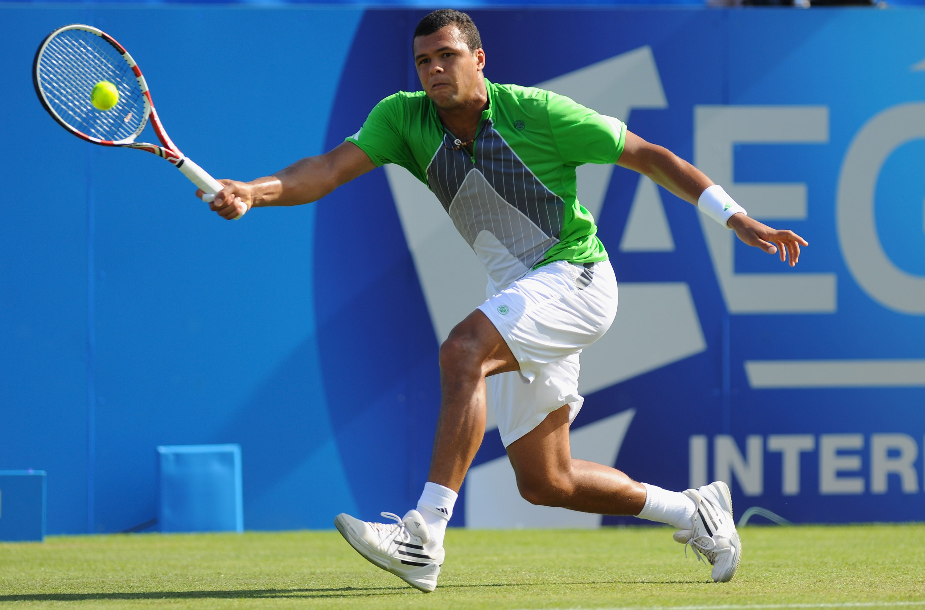 EASTBOURNE, ENGLAND - JUNE 14:  Jo-Wilfred Tsonga of France in action against Denis Istomin of Uzbekistan during day four of the AEGON International at Devonshire Park on June 14, 2011 in Eastbourne, England.  (Photo by Mike Hewitt/Getty Images)