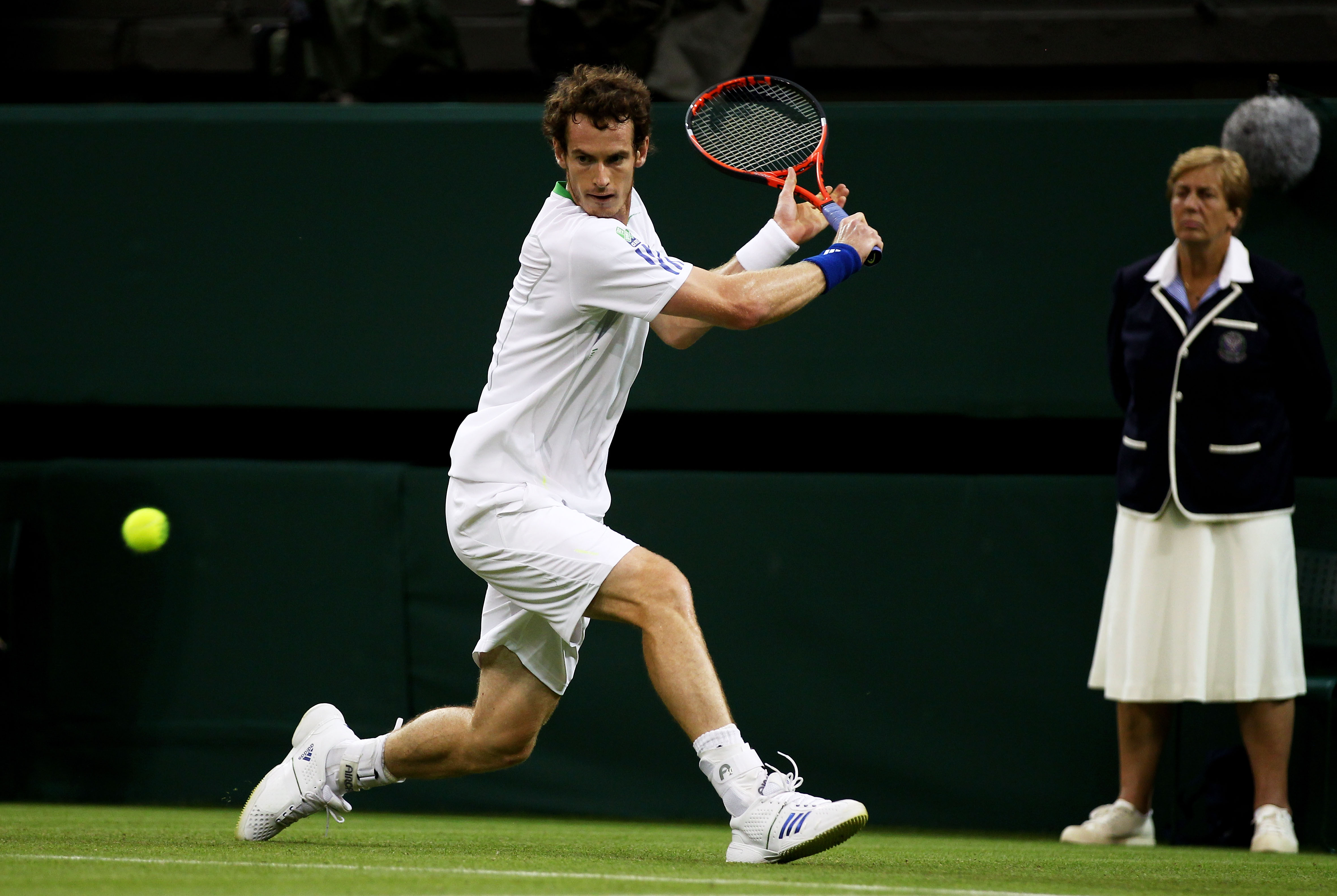 LONDON, ENGLAND - JUNE 20:  Andy Murray of Great Britain hits a backhand during his first round match against Daniel Gimeno-Traver of Spain on Day One of the Wimbledon Lawn Tennis Championships at the All England Lawn Tennis and Croquet Club on June 20, 2