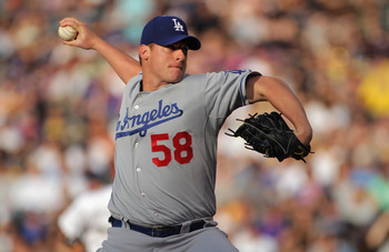 DENVER, CO - JUNE 10:  Starting pitcher Chad Billingsley #58 of the Los Angeles Dodgers delviers against the Colorado Rockies as he pitched 4 2/3  innings and left the game with the Rockies leading 6-0 at Coors Field on June 10, 2011 in Denver, Colorado.