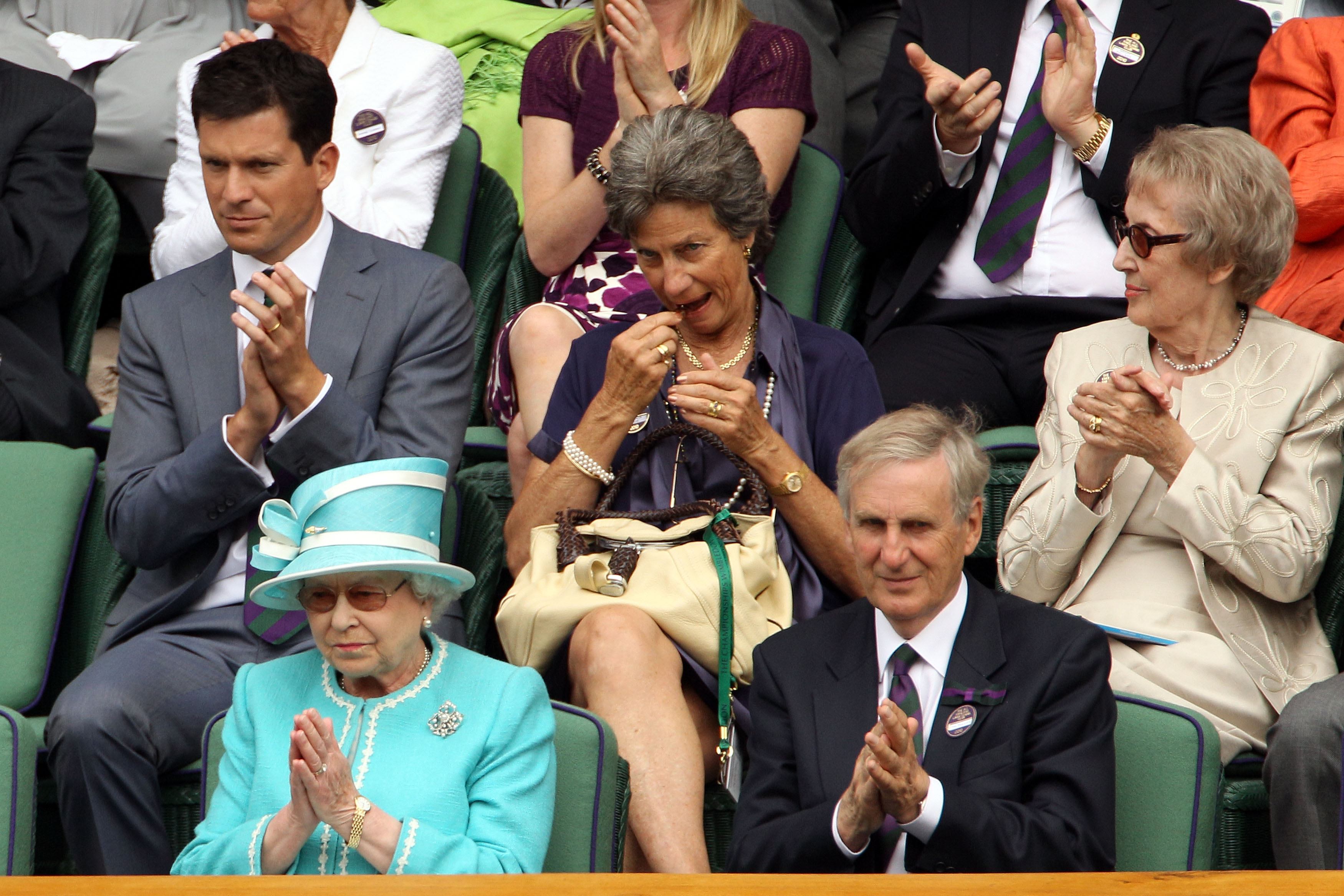 LONDON, ENGLAND - JUNE 24:  Tim Henman (top), and Queen Elizabeth II applaud as Andy Murray of Great Britain beats Jarkko Nieminen of Finland on Day Four of the Wimbledon Lawn Tennis Championships at the All England Lawn Tennis and Croquet Club on June 24