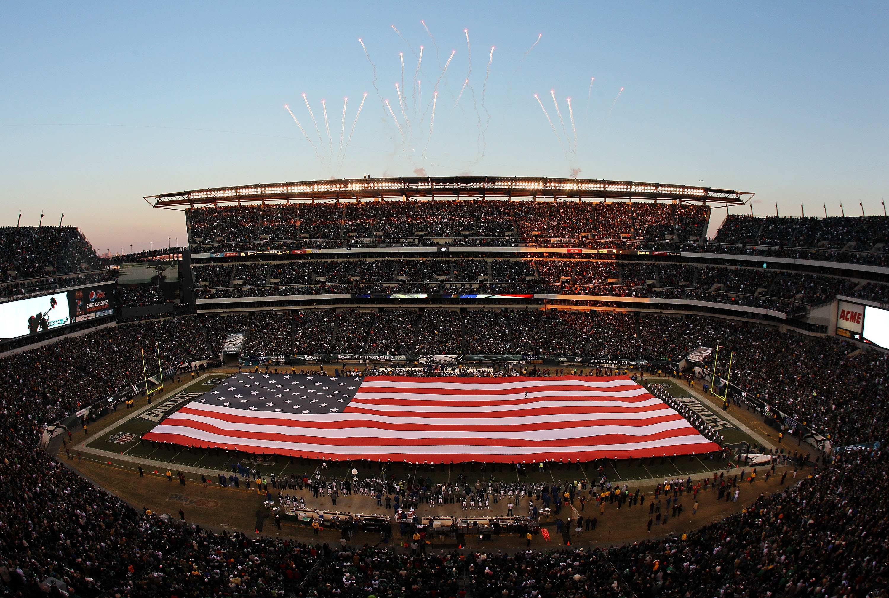 PHILADELPHIA, PA - JANUARY 09:  The color guard presents a full field flag for the national anthem before the game between the Green Bay Packers and the Philadelphia Eagles in the 2011 NFC wild card playoff game at Lincoln Financial Field on January 9, 20