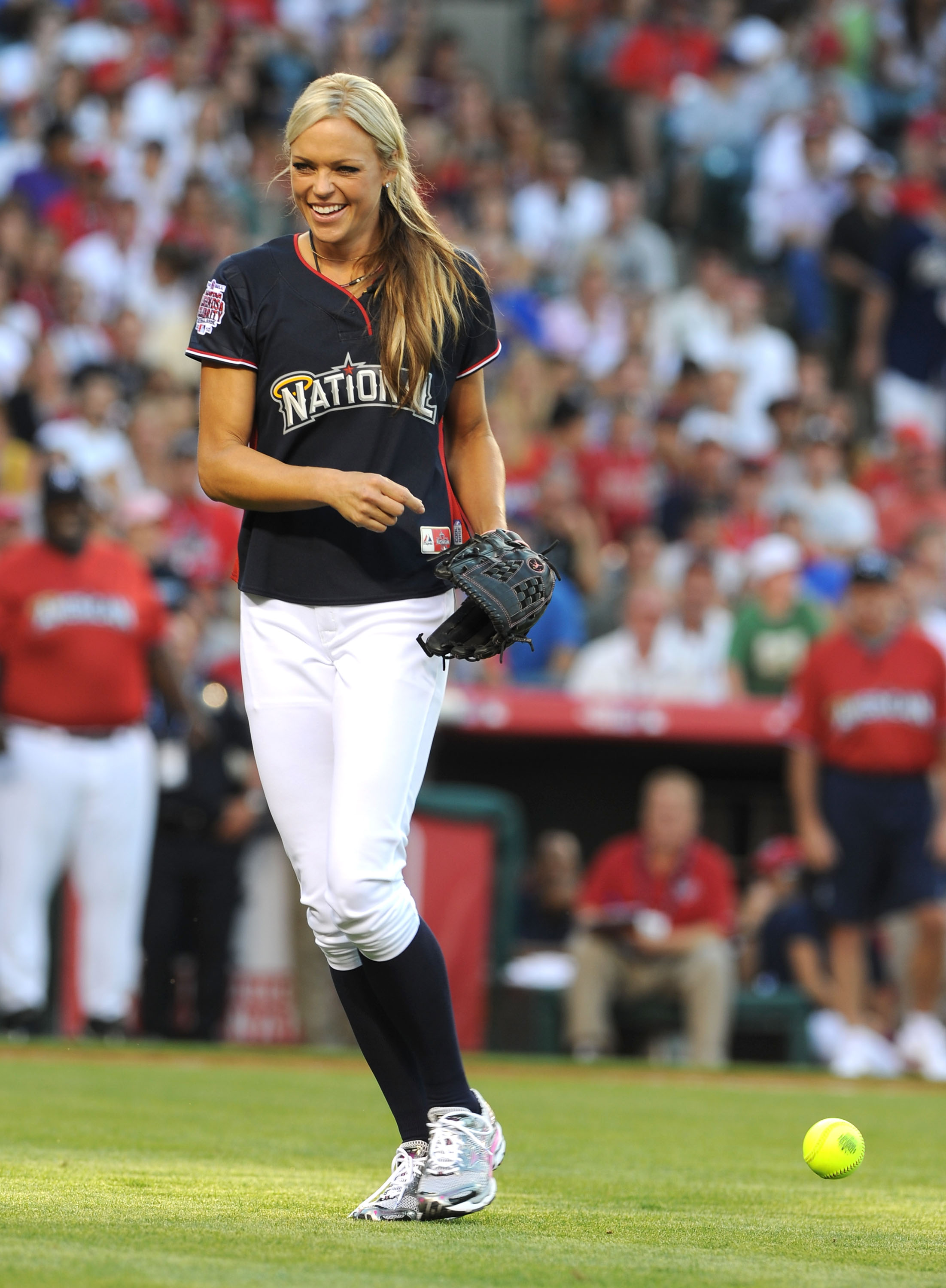 ANAHEIM, CA - JULY 11:  Softball Olympic gold medalist Jennie Finch pitches during the MLB All Star Game Celebrity Softball Game at Angels Stadium of Anaheim on July 11, 2010 in Anaheim, California.  (Photo by Michael Buckner/Getty Images)