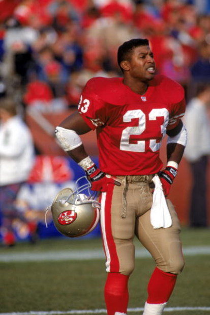 SAN FRANCISCO - DECEMBER 14: Spencer Tillman #23 of the San Francisco 49ers stands on the field during a game against the Kansas City Chiefs at Candlestick Park on December 14, 1991 in San Francisco, California. The 49ers won 28-14. (Photo by George Ro