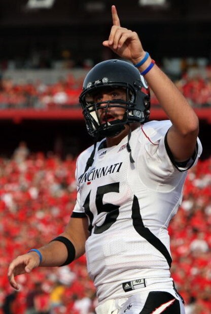 PISCATAWAY, NJ - SEPTEMBER 07: Tony Pike #15 of the Cincinnati Bearcats celebrates a touchdown against the Rutgers Scarlet Knights at Rutgers Stadium on September 7, 2009 in Piscataway, New Jersey. by Jim McIsaac/Getty Images)
