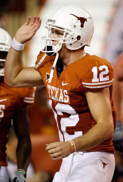 AUSTIN, TX - SEPTEMBER 19: Quarterback Colt McCoy #12 of the Texas Longhorns celebrates a touchdown against the Texas Tech Red Raiders at Darrell K Royal-Texas Memorial Stadium on September 19, 2009 in Austin, Texas. (Photo by Ronald Martinez/Getty Imag