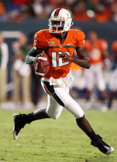 FORT LAUDERDALE, FL - SEPTEMBER 17: Quarterback Jacory Harris #12 of the Miami Hurricanes scrambles against the Georgia Tech Yellow Jackets at Land Shark Stadium on September 17, 2009 in Fort Lauderdale, Florida.  (Photo by Doug Benc/Getty Images)