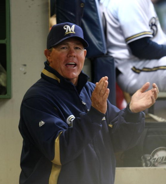 MILWAUKEE - APRIL 04: Manager Ned Yost of the Milwaukee Brewers encourages his team in the dugout during the Opening Day game against the San Francisco Giants on April 4, 2008 at Miller Park in Milwaukee, Wisconsin. (Photo by Jonathan Daniel/Getty Images)