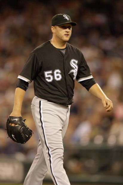 SEATTLE - AUGUST 12:  Mark Buehrle #56 of the Chicago White Sox walks off the field during the game against the Seattle Mariners on August 12, 2009 at Safeco Field in Seattle, Washington. (Photo by Otto Greule Jr/Getty Images) 