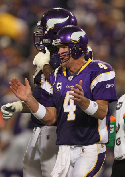 MINNEAPOLIS - SEPTEMBER 27: Brett Favre #4 of the Minnesota Vikings encourages his teammates in the huddle during the 4th quarter against the San Francisco 49ers at the Hubert H. Humphrey Metrodome on September 27, 2009 in Minneapolis, Minnesota. The Viki