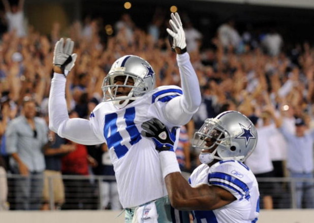 ARLINGTON, TX - SEPTEMBER 28:  Terence Newman #41 of the Dallas Cowboys celebrates with teammate Ken Hamlin #26 after returning an interception for a touchdown in the fourth quater against the Carolina Panthers at Cowboys Stadium on September 28, 2009 in 