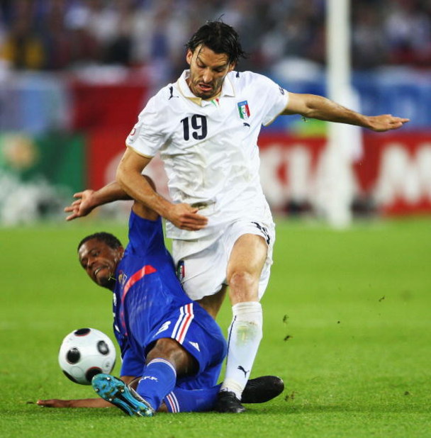 ZURICH, SWITZERLAND - JUNE 17:  Patrice Evra of France challenges Gianluca Zambrotta of Italy during the UEFA EURO 2008 Group C match between France and Italy at Letzigrund Stadion on June 17, 2008 in Zurich, Switzerland.  (Photo by Phil Cole/Getty Images