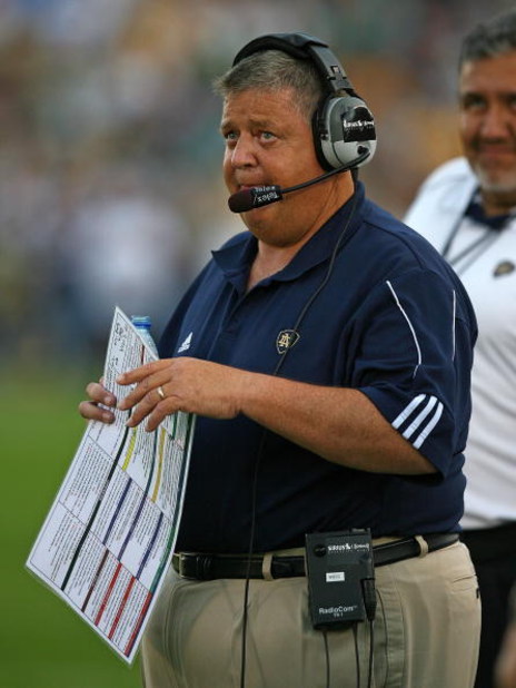 SOUTH BEND, IN - SEPTEMBER 19: Head coach Charlie Weis of the Notre Dame Fighting Irish watches as his team takes on the Michigan State Spartans on September 19, 2009 at Notre Dame Stadium in South Bend, Indiana. Notre Dame defeated Michigan State 33-30. 