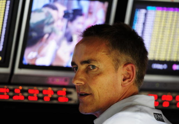 SINGAPORE - SEPTEMBER 26:  McLaren Mercedes Team Principal Martin Whitmarsh is seen on the pitwall during qualifying for the Singapore Formula One Grand Prix at the Marina Bay Street Circuit on September 26, 2009 in Singapore.  (Photo by Clive Mason/Getty