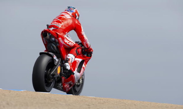 MONTEREY, CA - JULY 4:  Casey Stoner of Australia rides the #27 Ducati during practice for the Moto GP Red Bull U. S. Grand Prix at the Mazda Raceway Laguna Seca on July 4, 2009 in Monterey, California.  (Photo by Robert Laberge/Getty Images)