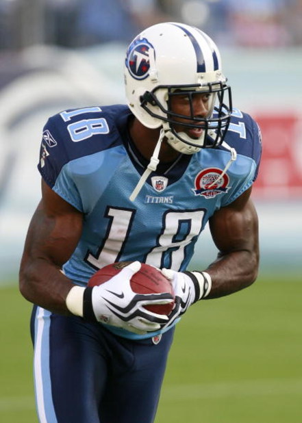 NASHVILLE, TN - SEPTEMBER 3: Kenny Britt #18 of the Tennessee Titans runs with the ball in pregame warmups against the Green Bay Packers during a preseason NFL game at LP Field on September 3, 2009 in Nashville, Tennessee. The Titans beat the Packers 27-1