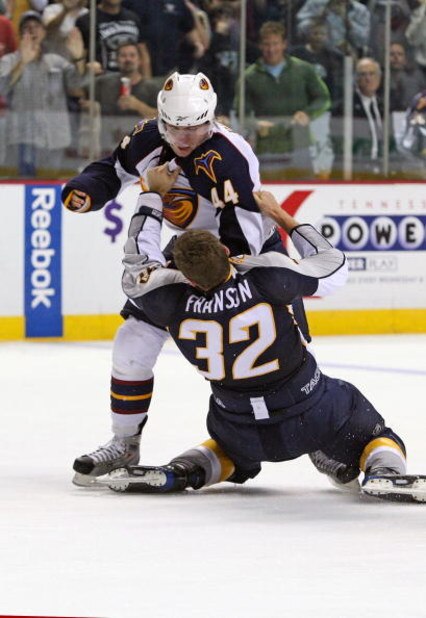 NASHVILLE, TN - SEPTEMBER 17: Defenseman Arturs Kulda #44 of the Atlanta Thrashers fights defenseman Cody Franson #32 of the Nashville Predators during a pre-season NHL game at the Sommet Center on September 17, 2009 in Nashville, Tennessee. (Photo by F