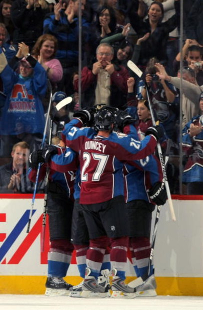 DENVER - OCTOBER 03:  The Colorado Avalanche celebrate a second period goal by Paul Stastny #26 to take a 2-0 lead over the Vancouver Canucks during NHL action at the Pepsi Center on October 3, 2009 in Denver, Colorado.  (Photo by Doug Pensinger/Getty Ima