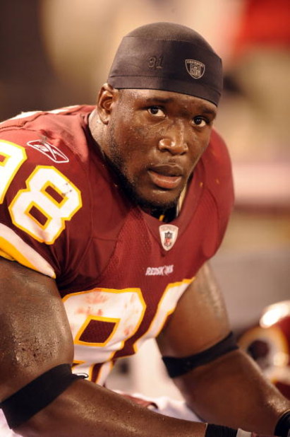 BALTIMORE, MD - AUGUST 13:  Brian Orakpo #98 of the Washington Redskins looks on during a NFL preseason football game against the Baltimore Ravens on August 13, 2009 at M & T Bank Stadium in Baltimore, Maryland.   (Photo by Mitchell Layton/Getty Images)