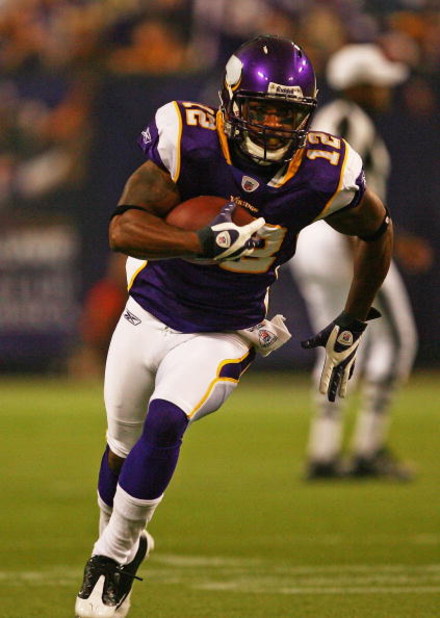 MINNEAPOLIS - SEPTEMBER 27: Percey Harvin #12 of the Minnesota Vikings runs with the ball against the San Francisco 49ers at the Hubert H. Humphrey Metrodome on September 27, 2009 in Minneapolis, Minnesota. The Vikings defeated the 49ers 27-24.  (Photo by