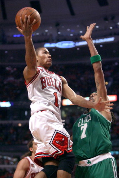 CHICAGO - APRIL 23: Derrick Rose #1 of the Chicago Bulls drives to the basket past Mikki Moore #7 of the Boston Celtics in Game Three of the Eastern Conference Quarterfinals during the 2009 NBA Playoffs at the United Center on April 23, 2009 in Chicago, I
