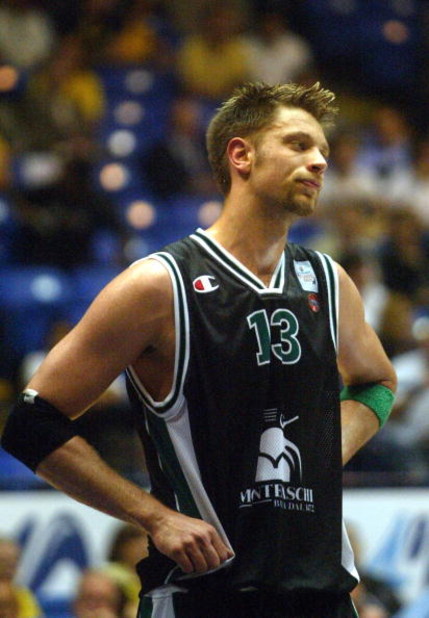 TEL AVIV, ISRAEL - APRIL 29:  Danish national player David Andersen #13 of Montepaschi Siena watches a lost play against Skipper Bologna during the two Italian teams' semi-final match April 29, 2004 in the 2004 Euroleague Final Four tournament in Tel Aviv