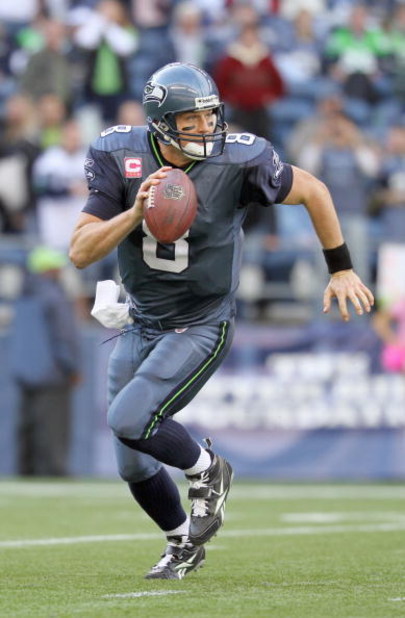 SEATTLE - OCTOBER 18: Quarterback Matt Hasselbeck #8 of the Seattle Seahawks moves to pass the ball during the game against the Arizona Cardinals on October 18, 2009 at Qwest Field in Seattle, Washington. (Photo by Otto Greule Jr/Getty Images)