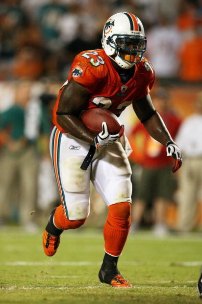 MIAMI - OCTOBER 12: Running back Ronnie Brown #23 of the Miami Dolphins looks for room to run against the New York Jets at Land Shark Stadium on October 12, 2009 in Miami, Florida. The Dolphins defeated the Jets 31-27. (Photo by Doug Benc/Getty Images)