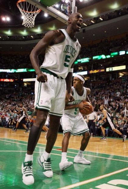 BOSTON - FEBRUARY 08: Kevin Garnett #5 of the Boston Celtics celebrates a shot against the San Antonio Spurs on February 8, 2009 at TD Banknorth Garden in Boston, Massachusetts. The Spurs defeated the Celtics 105-99. NOTE TO USER: User expressly acknowle