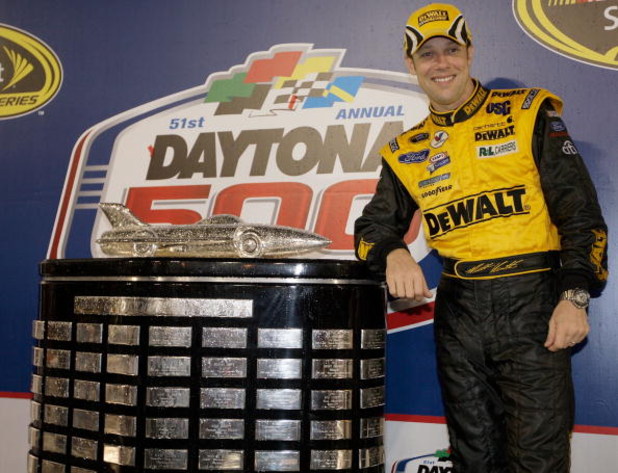 DAYTONA BEACH, FL - FEBRUARY 15: Matt Kenseth, driver of the #17 DEWALT Ford, celebrates in victory lane after winning the NASCAR Sprint Cup Series Daytona 500 at Daytona International Speedway on February 15, 2009 in Daytona Beach, Florida. (Photo by J