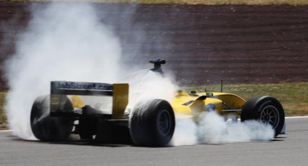 TAUPO, NEW ZEALAND - JANUARY 23: Fairuz Fauzy of Malaysia smokes his tyres up as he spins his car at the hairpin turn during official practice session two for the New Zealand A1 Grand Prix at the Taupo Race Track January 23, 2009 in Taupo, New Zealand.