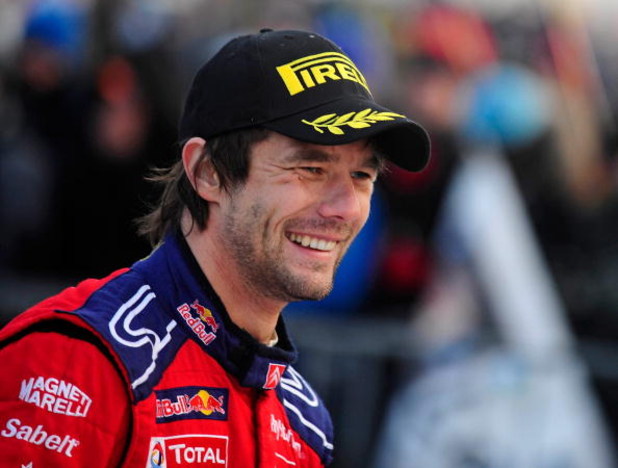 HAMAR, NORWAY - FEBRUARY 15: Sebastien Loeb of France, driver of the Citroen C4 Total smiles after overall victory in Rally Norway 2009 on February 15, 2009 in Hamar, Norway. (Photo by Reporter Images/Getty Images)
