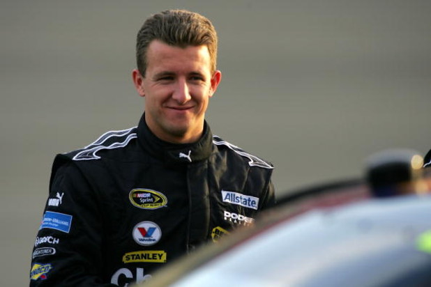 FONTANA, CA - FEBRUARY 20: AJ Allmendinger, driver of the #44 Charter Communications Dodge, prepares to drive during qualifying for the NASCAR Sprint Cup Series Auto Club 500 at Auto Club Speedway on February 20, 2009 in Fontana, California. (Photo by T