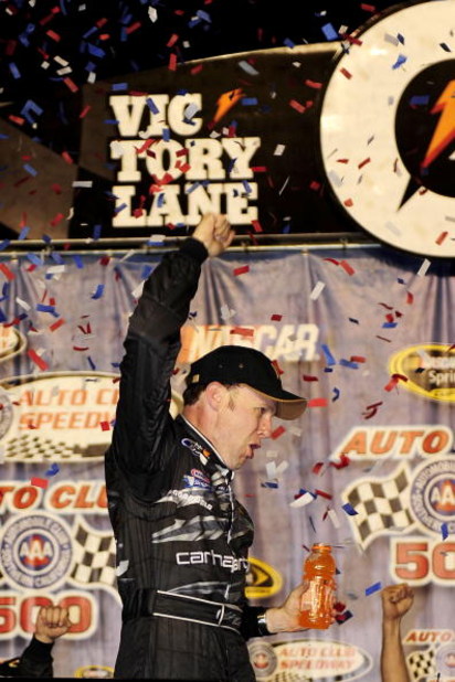 FONTANA, CA - FEBRUARY 22: Matt Kenseth, driver of the #17 Carhartt Ford, celebrates in victory lane after winning the NASCAR Sprint Cup Series Auto Club 500 at Auto Club Speedway on February 22, 2009 in Fontana, California. (Photo by Rusty Jarrett/Gett