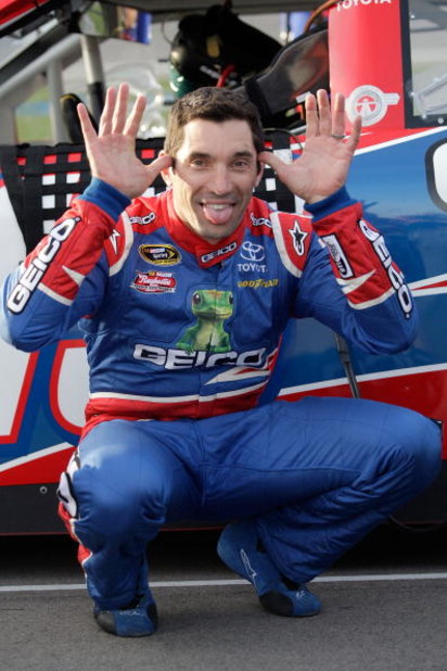 LAS VEGAS - FEBRUARY 27: Max Papis driver of the #13 Geico Toyota goofs off during qualifying for the NASCAR Sprint Cup Series Shelby 427 at the Las Vegas Motor Speedway on February 27, 2009 in Las Vegas, Nevada. (Photo by John Harrelson/Getty Images for