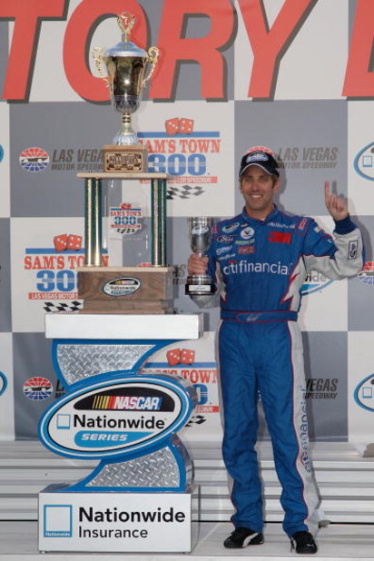 LAS VEGAS - FEBRUARY 28: Greg Biffle, driver of the #16 citifinancial Ford poses with the trophies in victory lane after winning the NASCAR Nationwide Series Sam's Town 300 at the Las Vegas Motor Speedway on February 28, 2009 in Las Vegas, Nevada. (Phot