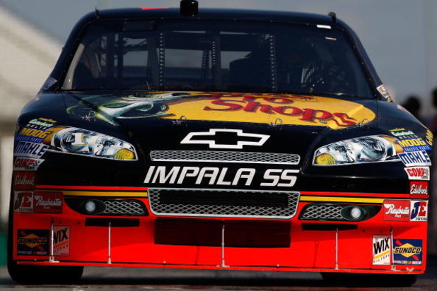 ATLANTA - MARCH 06: Martin Truex, Jr., driver of the #1 Bass Pro Shops/Tracker Boats Chevrolet drives through the garage area during practice for the NASCAR Sprint Cup Series Kobalt Tools 500 at the Atlanta Motor Speedway on March 6, 2009 in Hampton, Geo