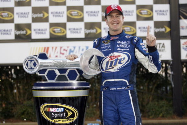HAMPTON, GA - MARCH 08: Kurt Busch, driver of the #2 Miller Lite Dodge, celebrates in victory lane after winning the NASCAR Sprint Cup Series Kobalt Tools 500 at the Atlanta Motor Speedway on March 8, 2009 in Hampton, Georgia. (Photo by Geoff Burke/Gett