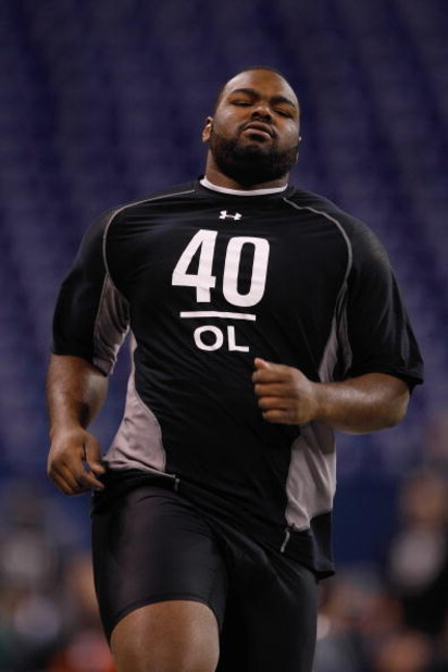 INDIANAPOLIS, IN - FEBRUARY 21:  Offensive lineman Michael Oher of Mississippi runs the 40 yard dash during the NFL Scouting Combine presented by Under Armour at Lucas Oil Stadium on February 21, 2009 in Indianapolis, Indiana. (Photo by Scott Boehm/Getty 
