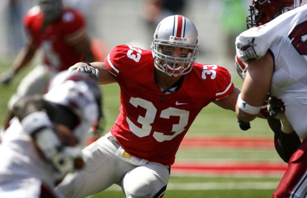 COLUMBUS, OH - SEPTEMBER 20:  James Laurinaitis #33 of the Ohio State Buckeyes keeps an eye on the runner during the third quarter while playing the Troy Trojans on September 20, 2008 at Ohio Stadium in Columbus, Ohio. Ohio State won the game 28-10.  (Pho