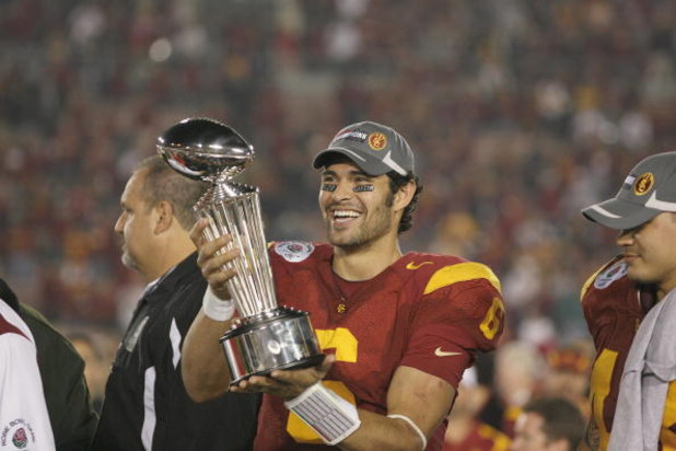 PASADENA, CA - JANUARY 1:  Mark Sanchez #6 of the USC Trojans smiles as he holds the Rose Bowl Trophy after the game against the Penn State Nittany Lions on January 1, 2009 at the Rose Bowl in Pasadena, California.  USC won 38-24.  (Photo by Jeff Golden/G