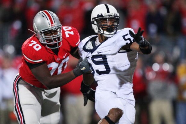 COLUMBUS, OH - OCTOBER 25: Offensive lineman Bryant Browning #70 of the Ohio State Buckeyes holds onto defensive lineman Aaron Maybin #59 of the Penn State Nittany Lions on October 25, 2008 at Ohio Stadium in Columbus, Ohio. No penalty was called on the p
