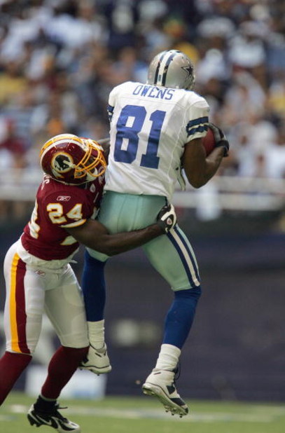 IRVING, TX - NOVEMBER 18: Wide receiver Terrell Owens #81 of the Dallas Cowboys makes a catch against Shawn Springs #24 of the Washington Redskins in the fourth quarter at Texas Stadium November 18, 2007 in Irving, Texas. (Photo by Ronald Martinez/Getty I