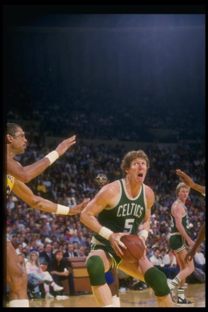 Undated:  Bill Walton of the Boston Celtics prepares to go up strong past center Kareem Abdul-Jabbar of the Los Angeles Lakers during the Celtics game versus the Lakers at the Forum in Inglewood, California. Mandatory Credit: Rick Stewart  /Allsport
