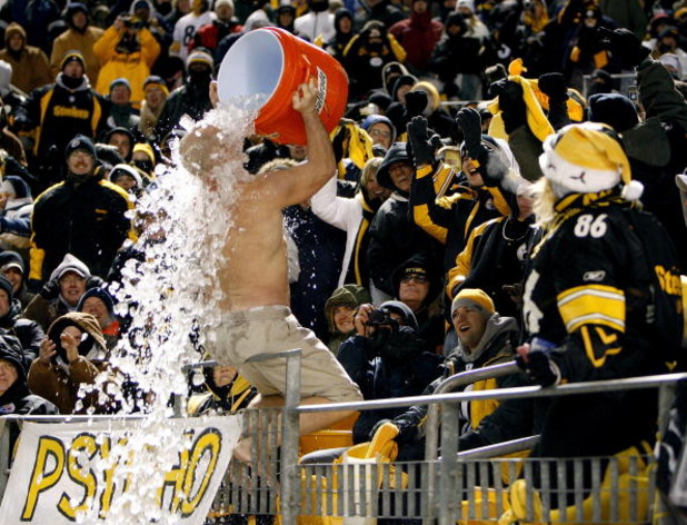PITTSBURGH - DECEMBER 07: Tom Congdon, a Pittsburgh Steelers vender, entertains the crowd by dumping ice water over himself in fifteen degree weather while the Steelers played the Dallas Cowboys on December 7, 2008 at Heinz Field in Pittsburgh, Pennsylvan