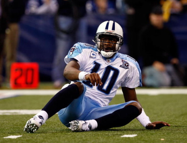 INDIANAPOLIS - DECEMBER 28:  Quarterback Vince Young #10 of the Tennessee Titans is slow to get up after taking a hit during the game against the Indianapolis Colts at Lucas Oil Stadium December 28, 2008 in Indianapolis, Indiana.  (Photo by Jamie Squire/G