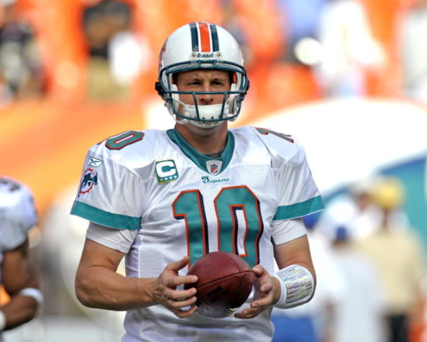 MIAMI, FL - JANUARY 4:  Quarterback Chad Pennington #10 of the Miami Dolphins warms up before play against the Baltimore Ravens in an NFL Wildcard Playoff Game at Dolphins Stadium on January 4, 2009 in Miami, Florida.  (Photo by Al Messerschmidt/Getty Ima